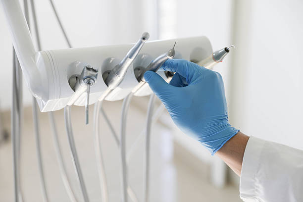 Professional Tooth Extraction technician working in Davis County County, IA
